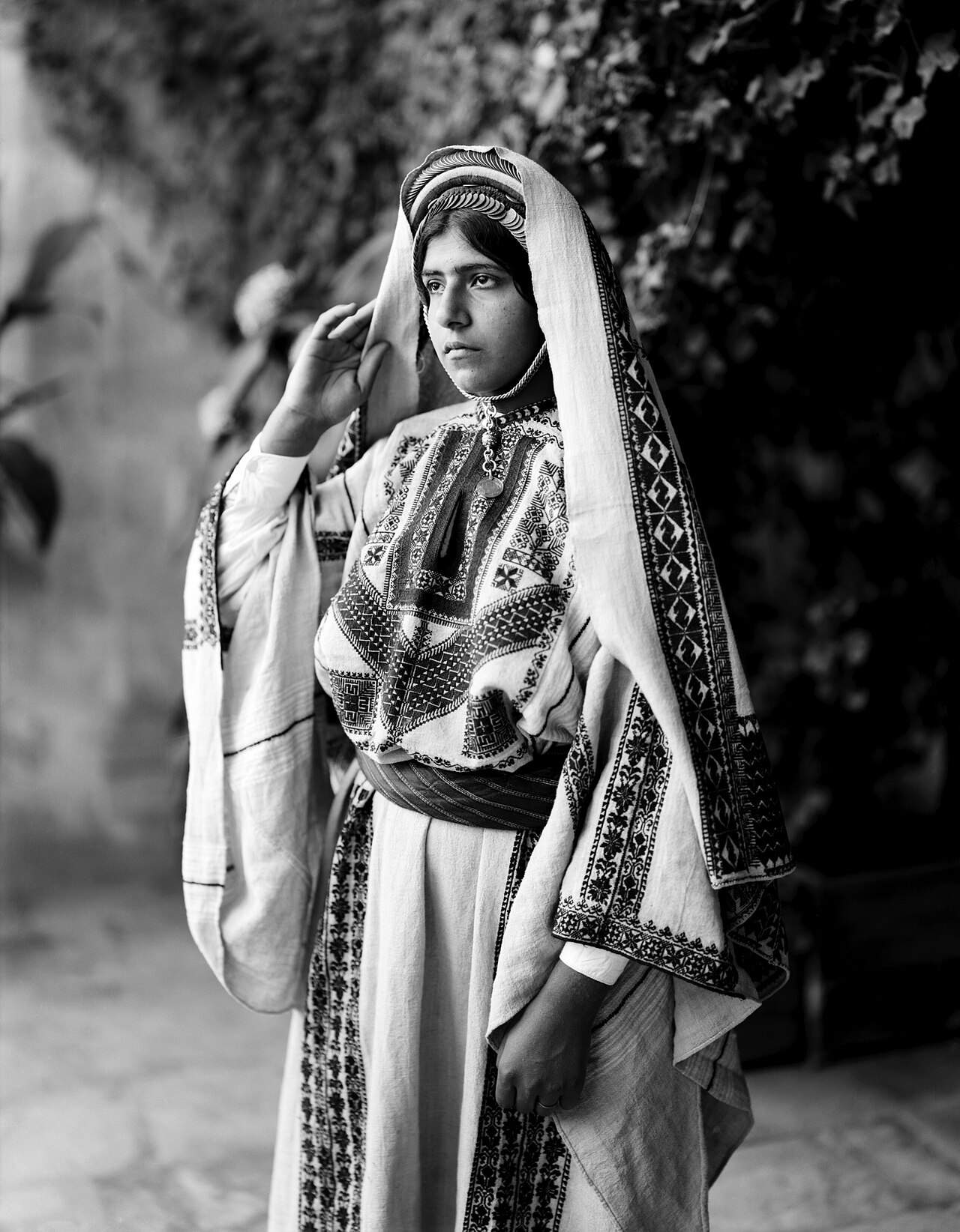 A woman of Ramallah wearing a traditional embroidered dress