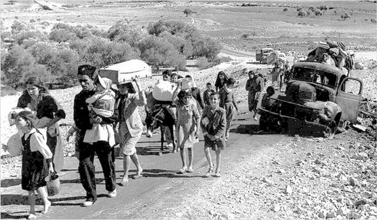 A column of Palestinian refugees leaving the Galilee, October 1948